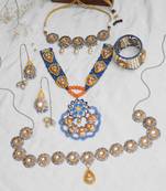 Boho-inspired complete kundan jewelry set with bangle,necklace, waistbelt, and earrings