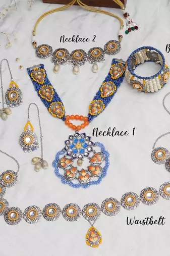 Boho-inspired complete kundan jewelry set with bangle,necklace, waistbelt, and earrings
