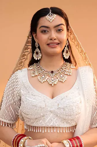 Regal bridal jewelry set: necklace, maangtikka, earrings, hathphool, anklet & maangtikka