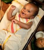 White sleeveless infant handloom kurta, dhoti pant and shoes set for kids