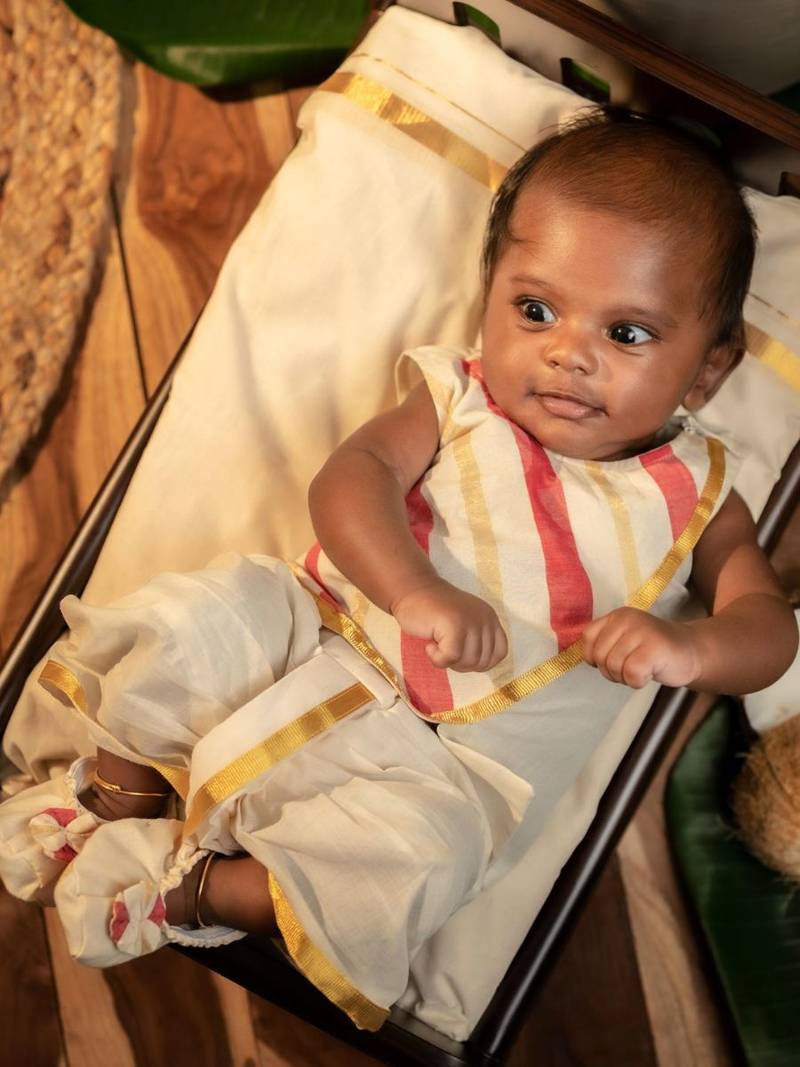 White sleeveless infant handloom kurta, dhoti pant and shoes set for kids