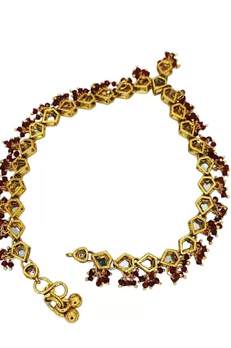 Gold plated kundan & maroon beads studded anklet