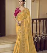 Yellow georgette party wear saree with blouse fabric 
