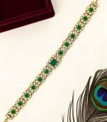 Gold plated green stone studded matha patti