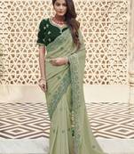 Light green georgette party wear saree with blouse fabric 