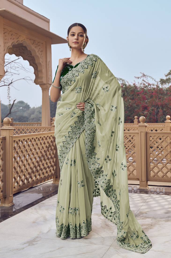 Pista green fancy organza party wear saree with blouse fabric 