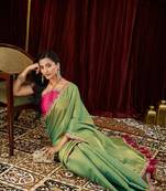 Cotton silk green sequinned embellished saree
