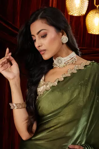 Organza green sequinned embellished saree