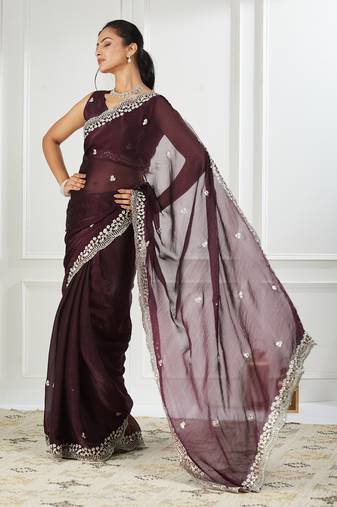 Magenta embroidered silk blend saree