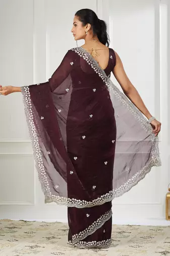 Magenta embroidered silk blend saree