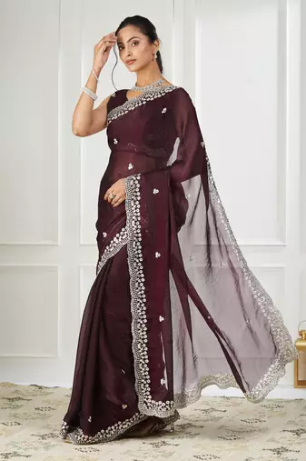 Magenta embroidered silk blend saree