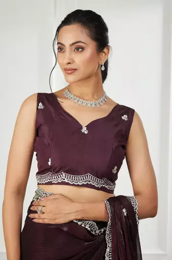 Magenta embroidered silk blend saree