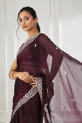 Magenta embroidered silk blend saree
