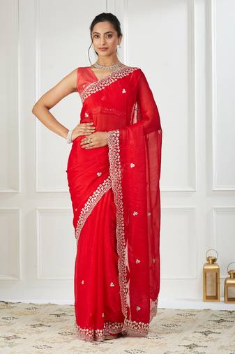 Red embroidered silk blend saree