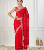 Red embroidered silk blend saree