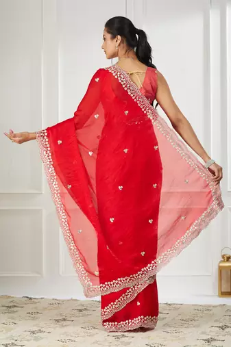 Red embroidered silk blend saree