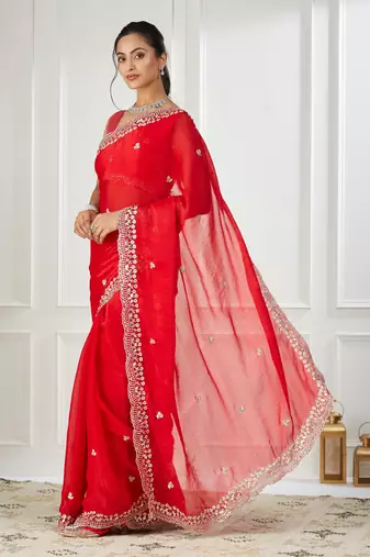 Red embroidered silk blend saree