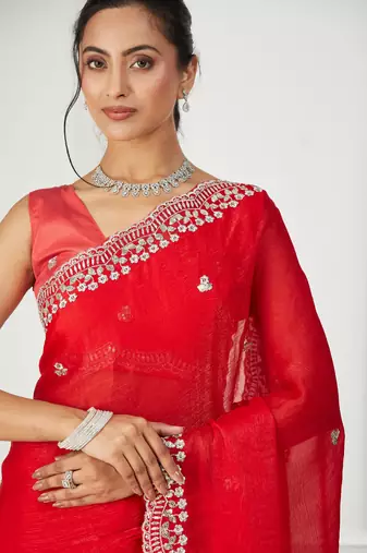 Red embroidered silk blend saree