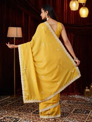 Pure georgette yellow embroidered saree 2