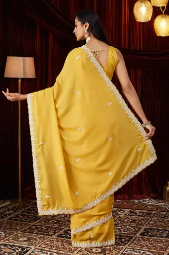 Pure georgette yellow embroidered saree