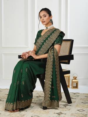 green embroidered silk blend saree 1