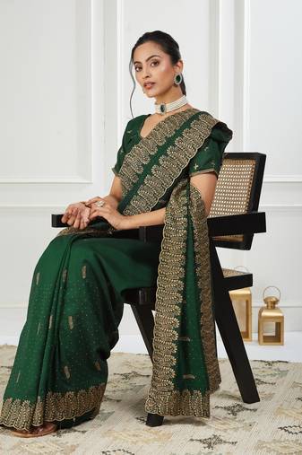 green embroidered silk blend saree