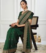 green embroidered silk blend saree