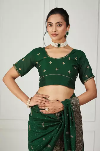 green embroidered silk blend saree