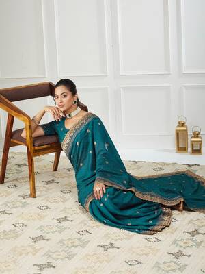 teal embroidered silk blend saree 1