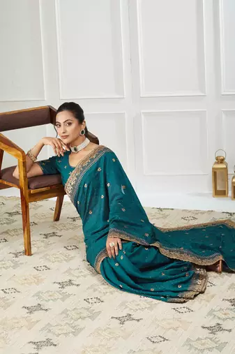 teal embroidered silk blend saree