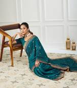 teal embroidered silk blend saree