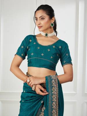 teal embroidered silk blend saree 4