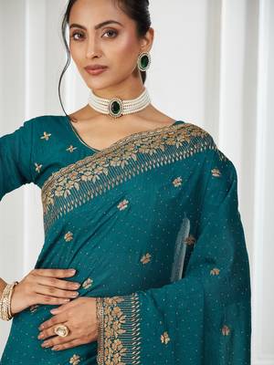 teal embroidered silk blend saree 5