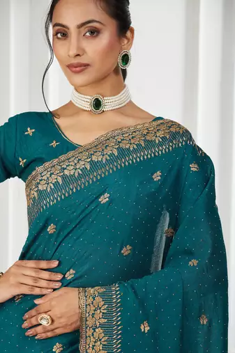 teal embroidered silk blend saree
