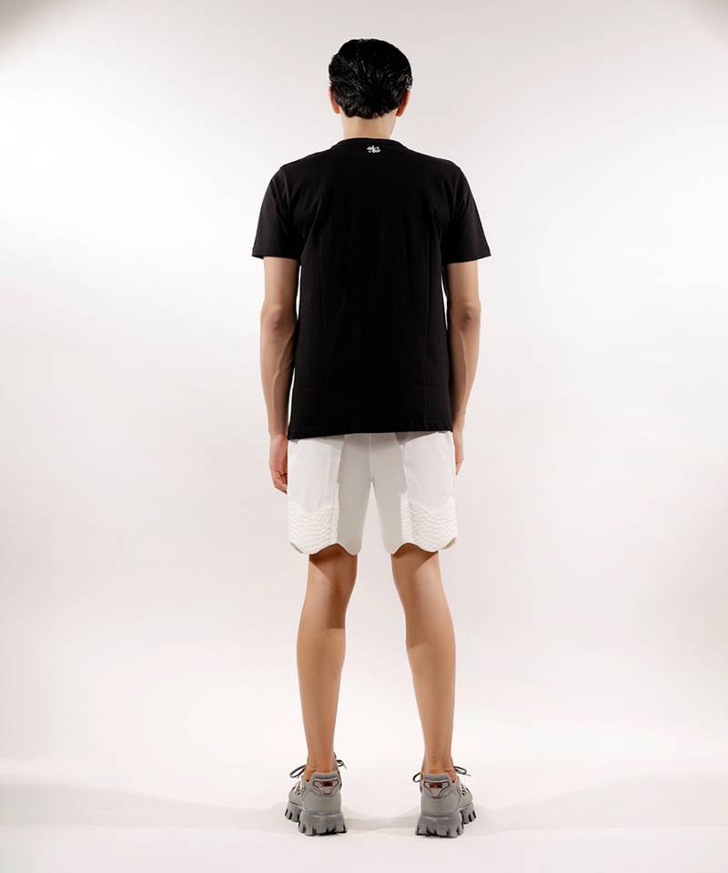 Snake texture quilted white shorts