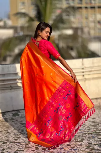 Orange gold zari woven paithani silk blend saree