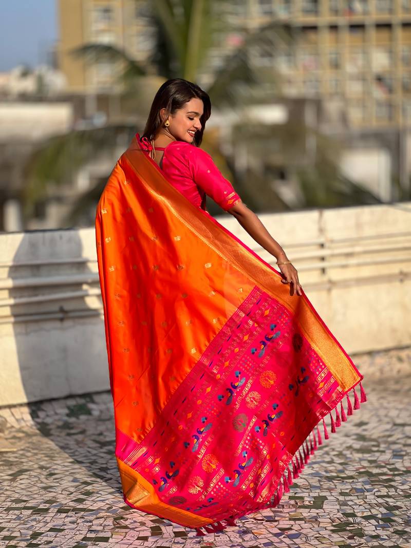 Orange gold zari woven paithani silk blend saree