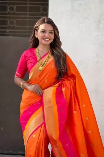 Orange gold zari woven paithani silk blend saree