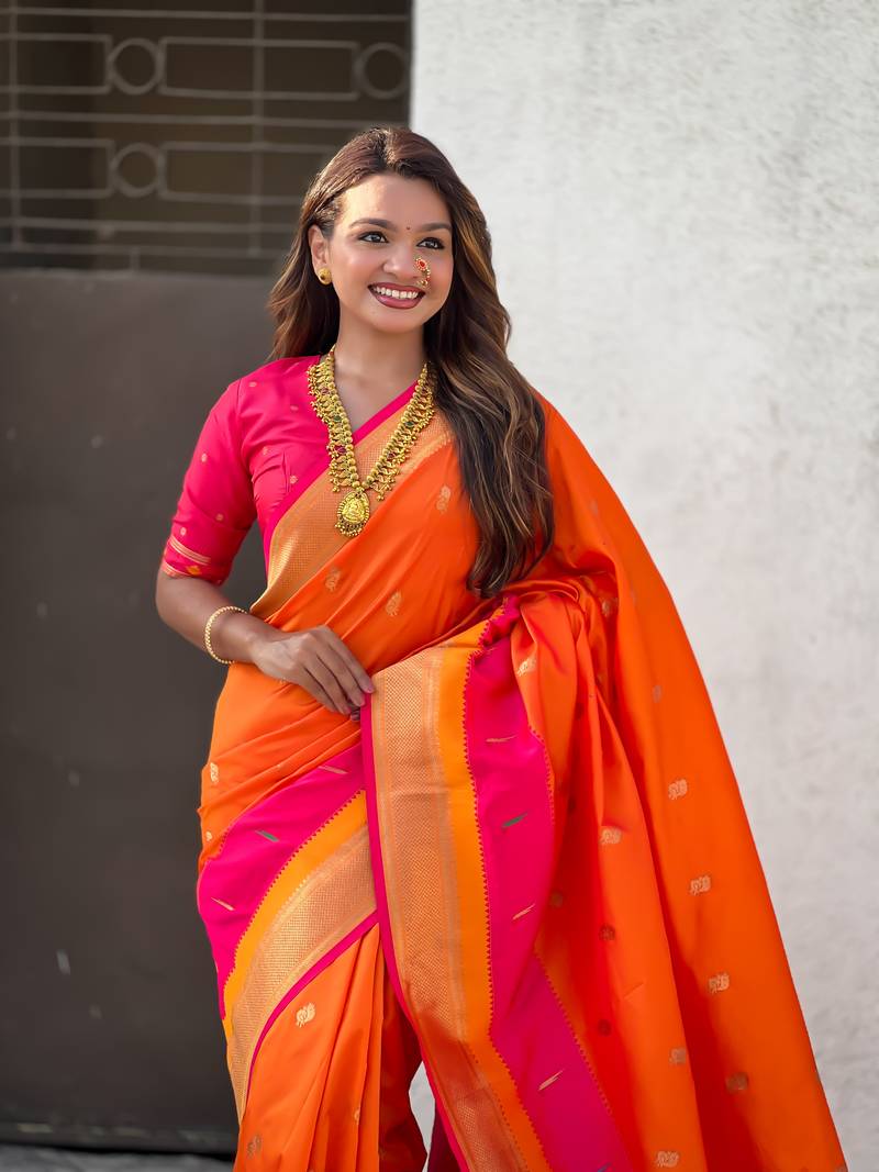 Orange gold zari woven paithani silk blend saree