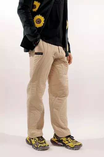 Abstract quilted beige satin pants