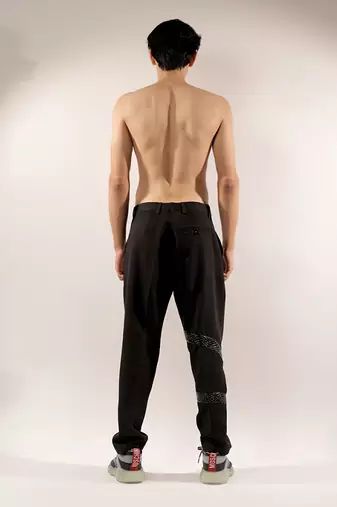 Snake quilted black cotton pants