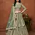 Pista Green Embroidered Zari Sequins Coading Net Lehenga