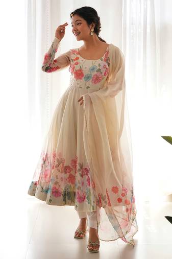 Featuring cream color ethnic wear gown set
