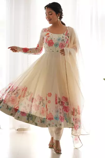 Featuring cream color ethnic wear gown set
