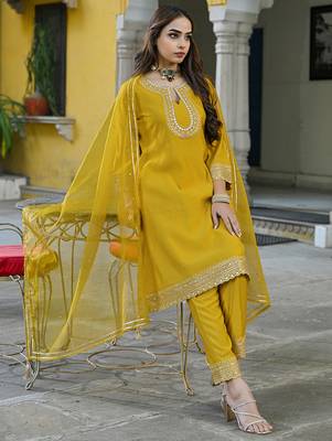 Women mustard silk blend solid embroidered a-line kurta trousers with dupatta 1