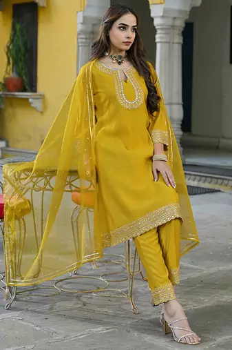 Women mustard silk blend solid embroidered a-line kurta trousers with dupatta