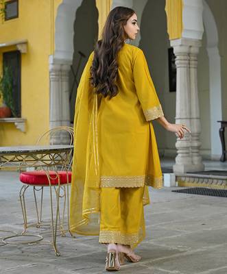 Women mustard silk blend solid embroidered a-line kurta trousers with dupatta 4