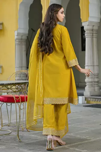 Women mustard silk blend solid embroidered a-line kurta trousers with dupatta