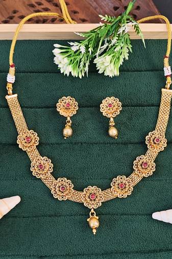 Traditional gold-plated floral necklace set with ruby stones, mesh chain design, drop earrings