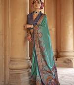 turquoise poly viscose silk blend woven butti printed saree